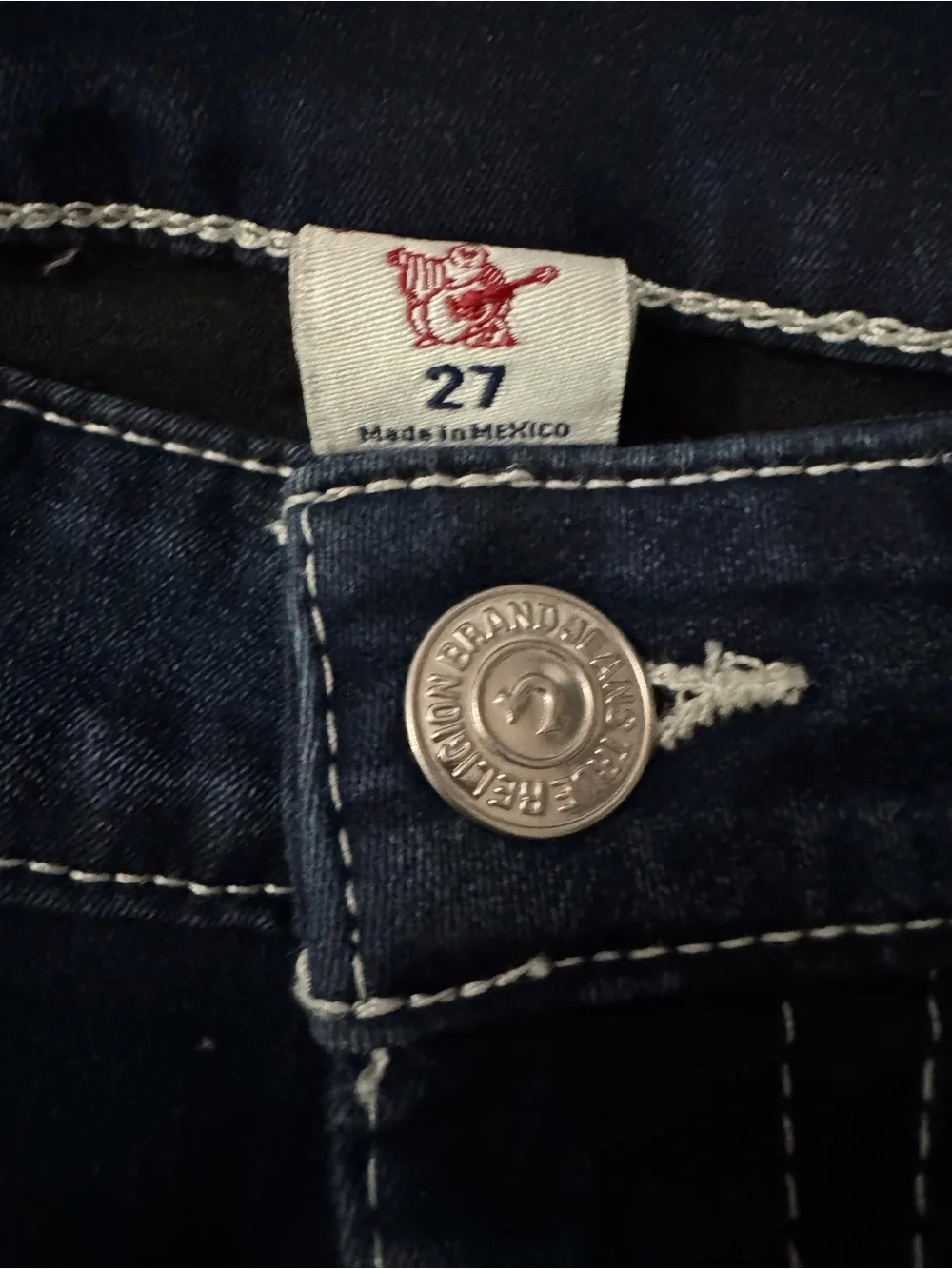 True Religion Dark Blue Skinny Jeans with White Stitching.Size 27. Inseam 27in.